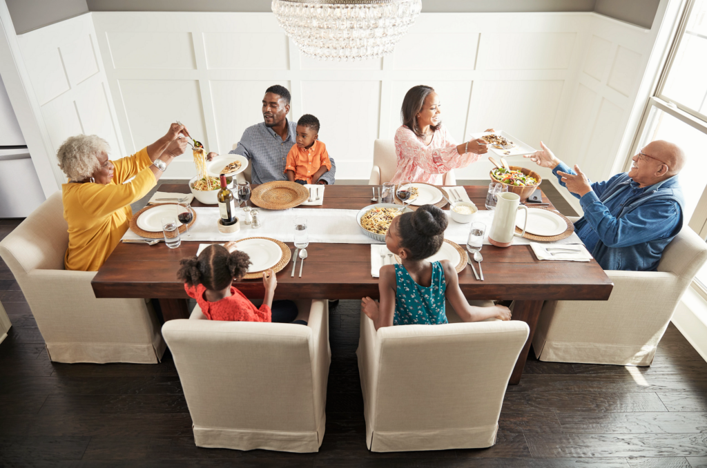 Family having breakfast at the dining table | JCB Interiors